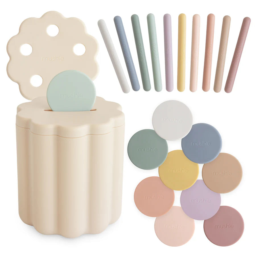 Juego de clasificación de monedas y tubos Mushie